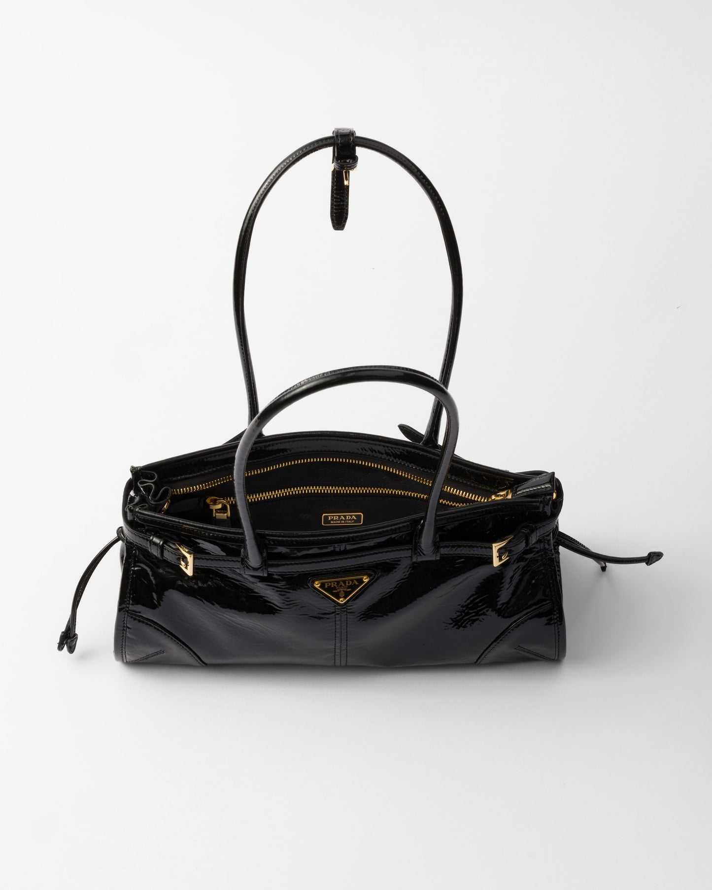 Bolsa Prada Bonnie em couro envernizado
