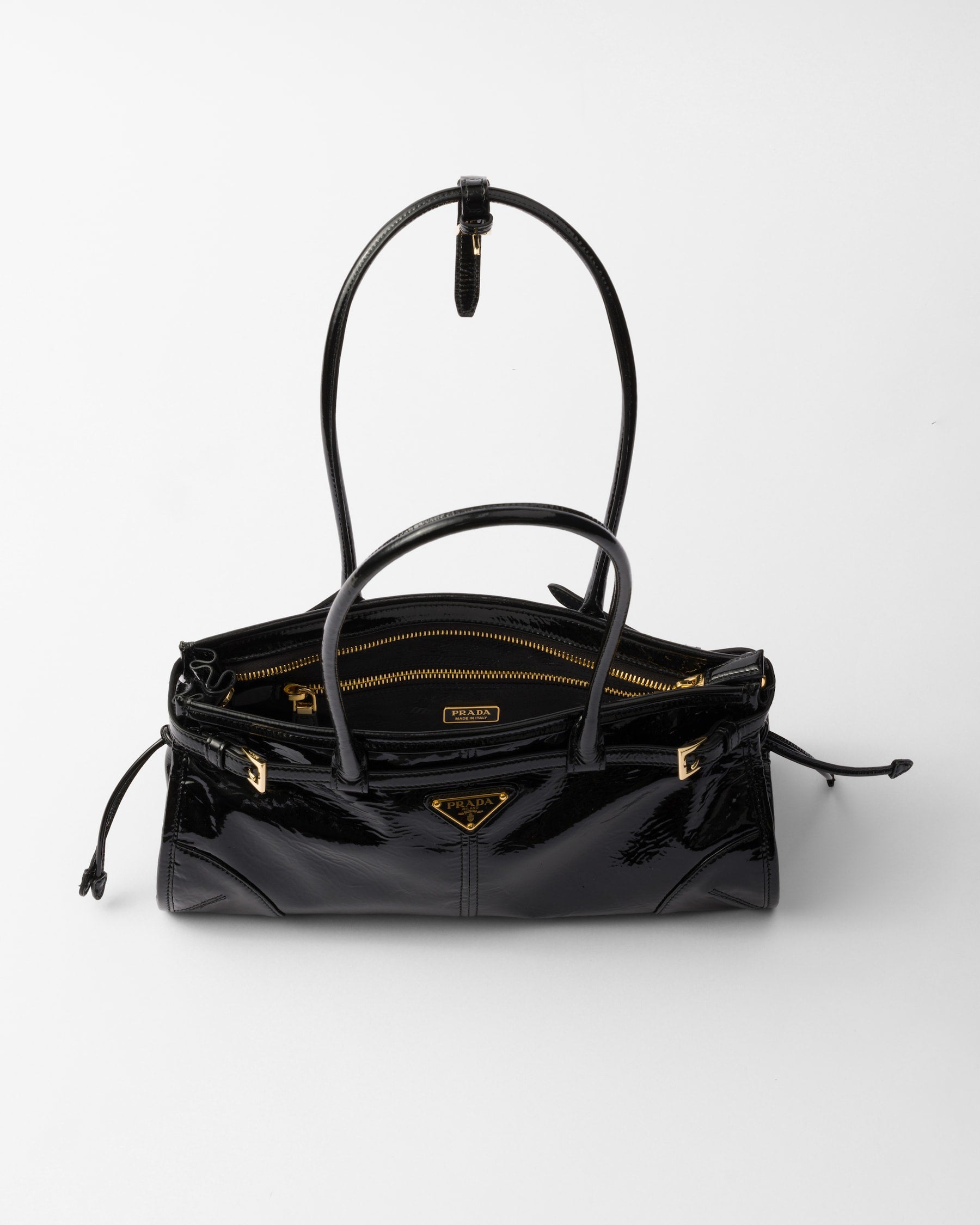 Bolsa Prada Bonnie em couro envernizado