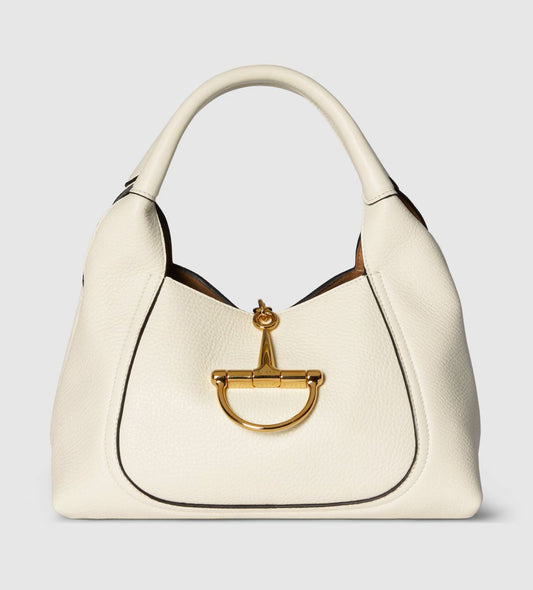 Gucci Softbit Média