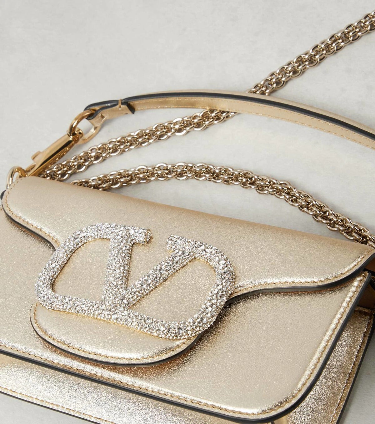 Valentino Garavani Locò de couro metálico