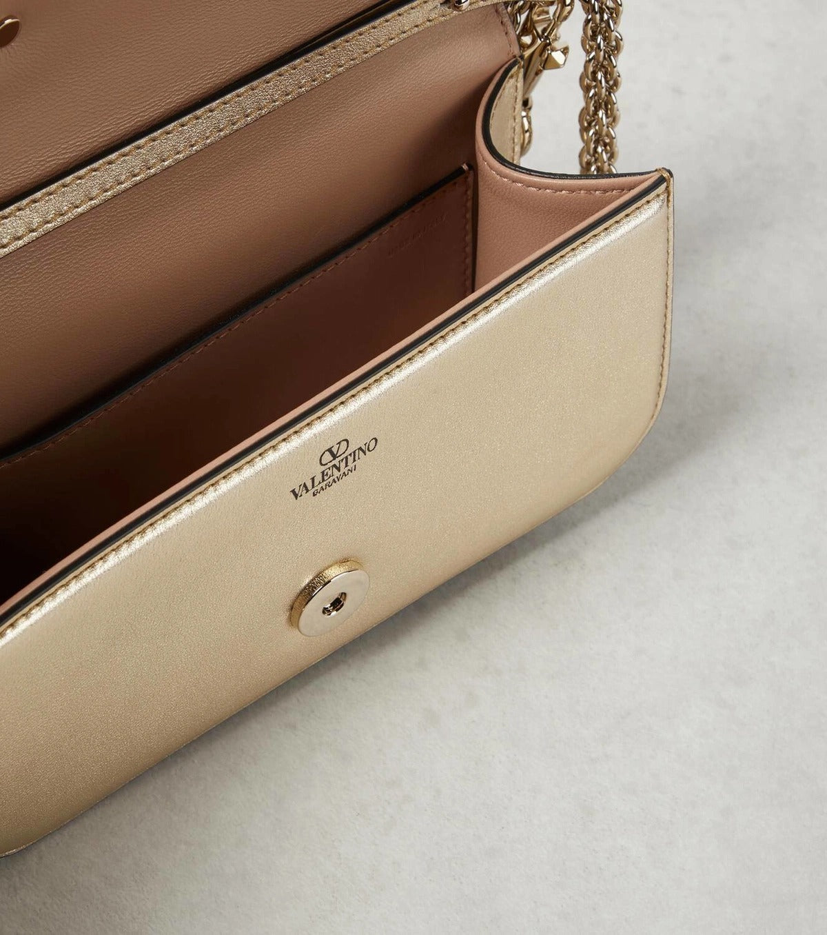 Valentino Garavani Locò de couro metálico