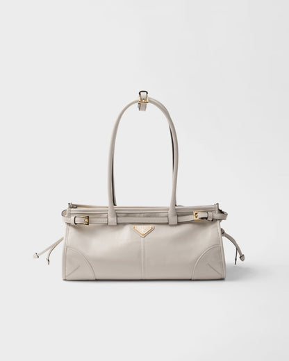Bolsa Prada Bonnie em couro envernizado