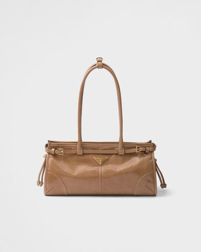 Bolsa Prada Bonnie em couro envernizado